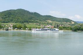 tourist boat on danube river in scenic Wachau walley, Austria