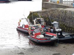 boats at the pier on the beach