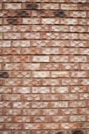 wall with decorative brick-shaped tiles