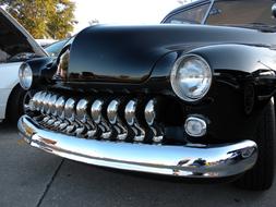 front of the black car