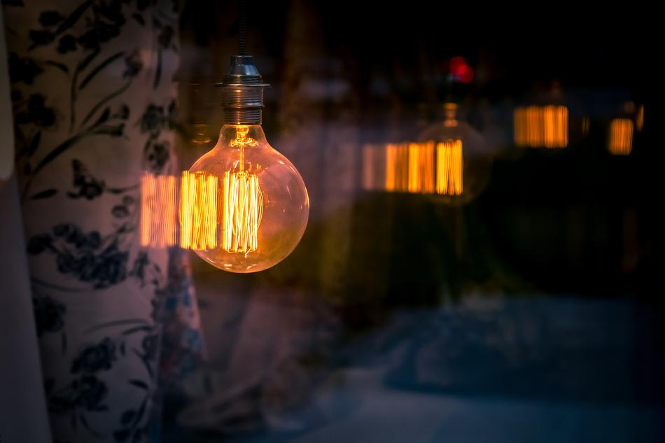 Beautiful, glass light bulb with orange light