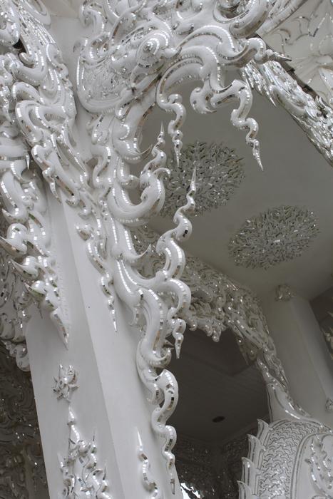 Beautiful, white construction with the beautiful ornament, in the building