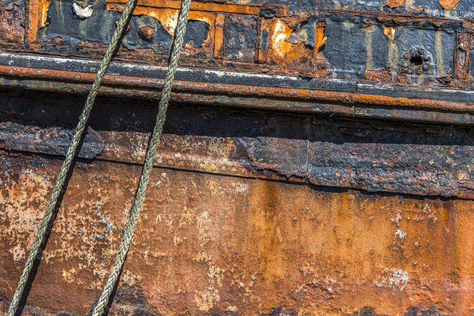 Colorful, old texture of the wood, with the peeling pain, and ropes
