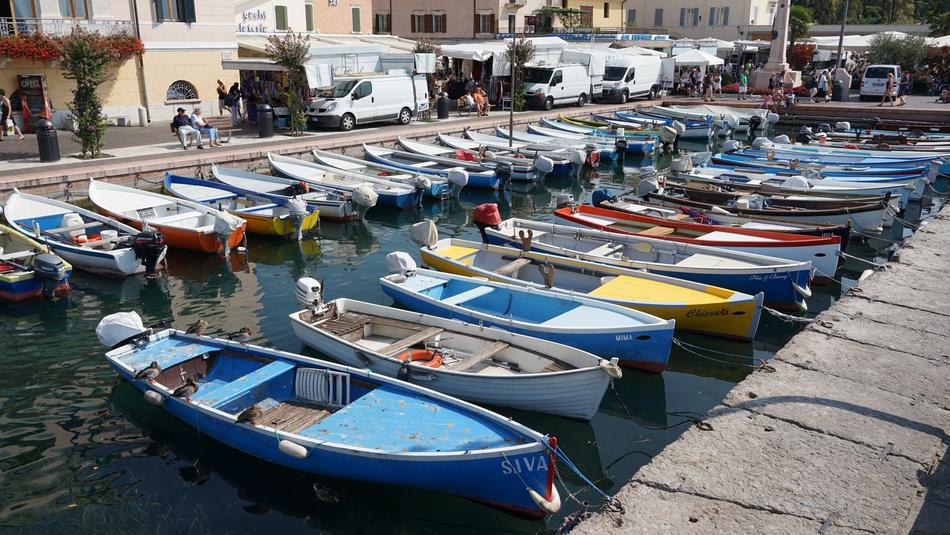 colorful boats on the pier in the city