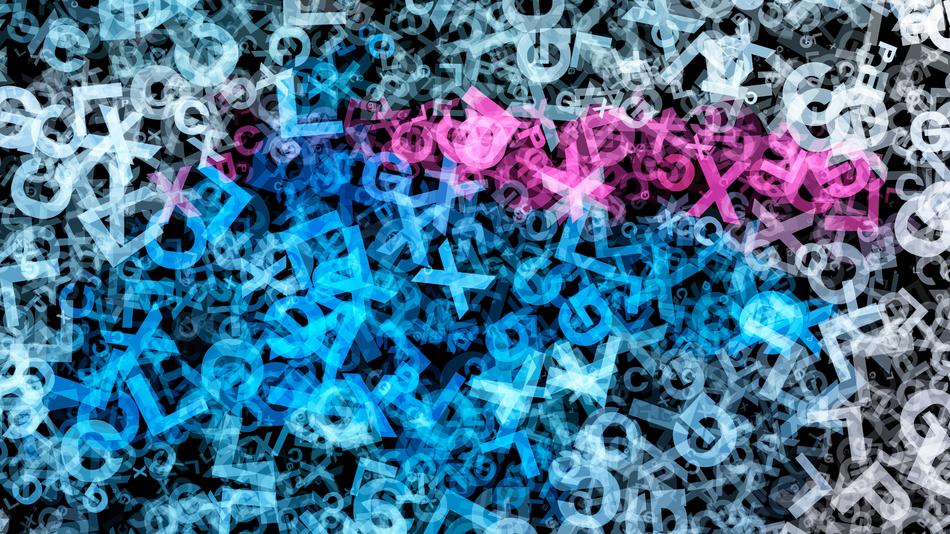 neon letters of different colors on a dark background
