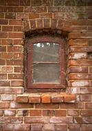 small old window on a brick facade