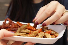 girl hand with a dish