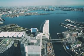 Beautiful skyline with the buildings , among the blue and turquoise water