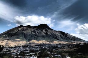 landscape on a volcano against a background of clouds