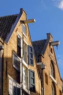 facades of shuttered brick buildings in Holland