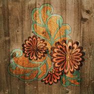floral drawing on wood wall