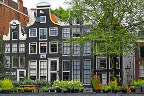 photo of a black brick building in Amsterdam