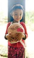 asian girl with soft toy bag