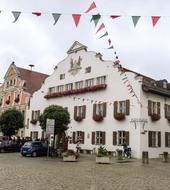 Beautiful and colorful town hall in Kelheim, Bavaria, Germany, with the flags