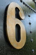 Number six on Old Metal surface