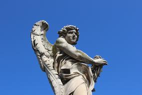 Angel monument and blue sky in Roma