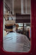 photo of window and Man Alone