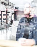 blurred silhouette of a man in a mall