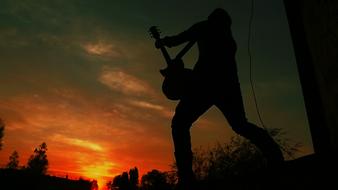 Silhouette Guy with Guitar