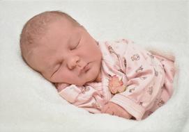 sweet dream of a newborn in pink