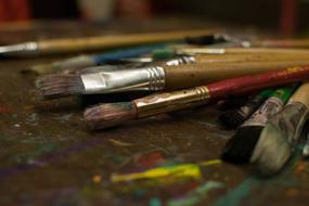 artist's brushes close-up on blurred background