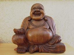 happy Buddha, wooden figurine, Serenity