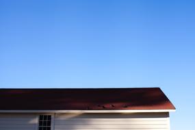 photo of the roof against the blue sky