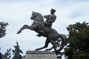 Sculpture man horse