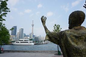 Toronto City river statue person