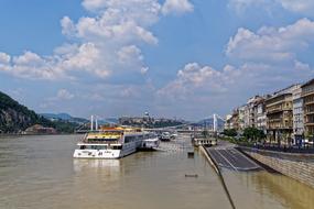 ships on the danube in budapest on a sunny day