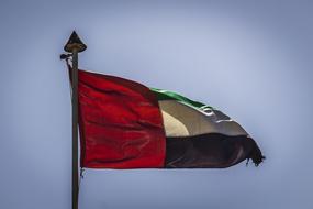 emirates flag on sky background