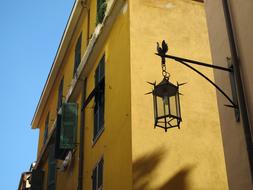 lamp on the facade of a traditional house in Liguria