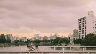 pink sky over city architecture at dusk