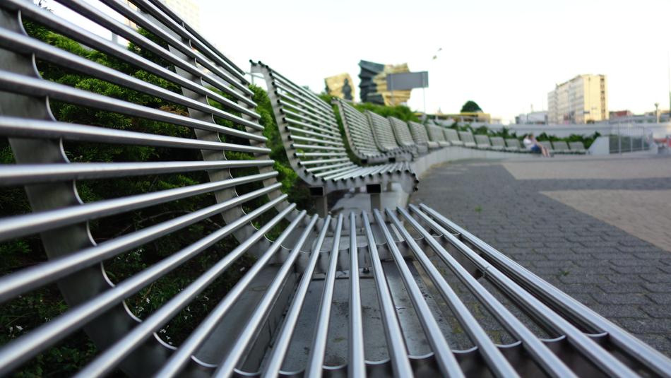 Row of the shiny benches, on the street of Katowice, Poland