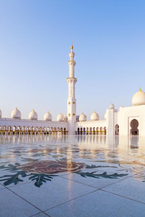 square in front of white architecture in asia