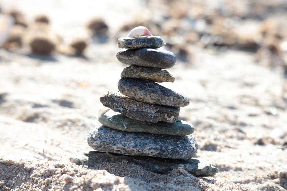 a small tower of stones on the ground
