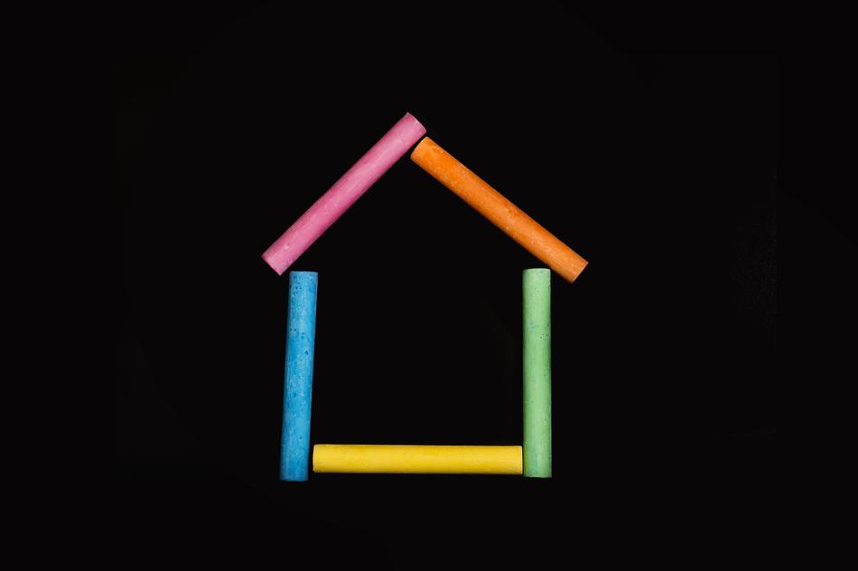 Beautiful home of the colorful chalk sticks, at black background