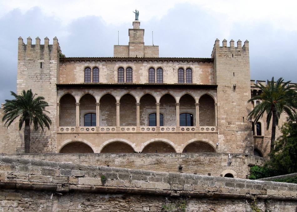 stone castle and palms in Spain