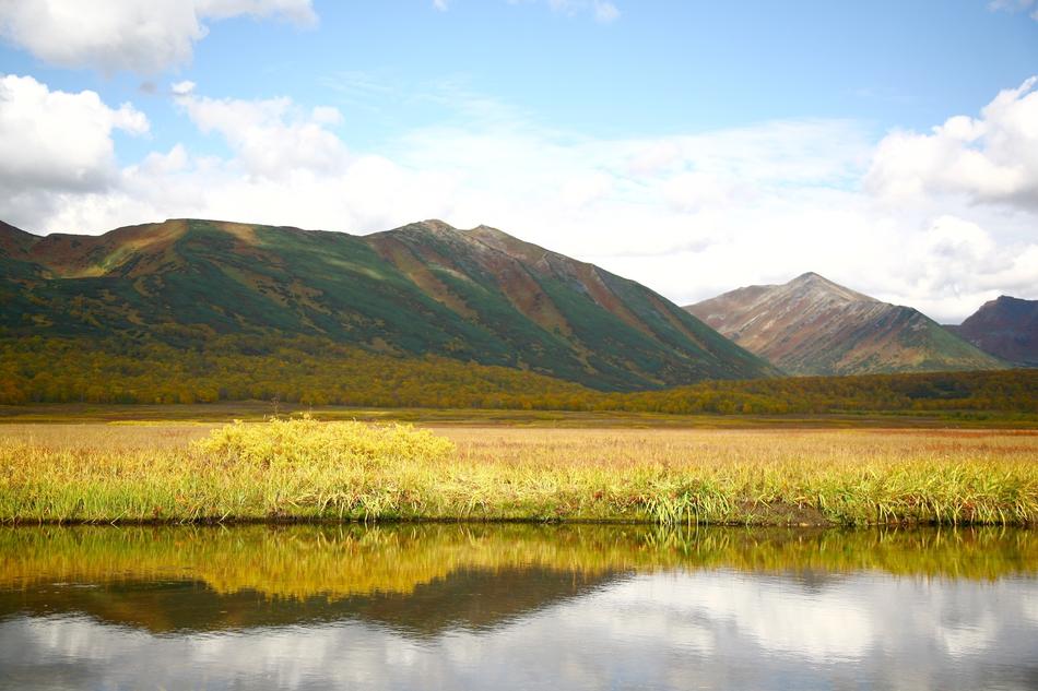 mountains, autumn grass and lake