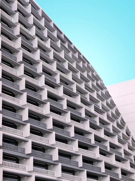Architecture with the balconies, under the beautiful, turquoise sky