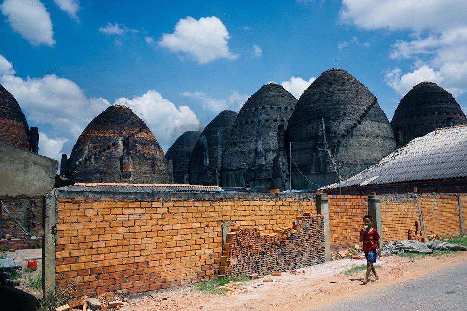 brick ovens behind wall, vietnam