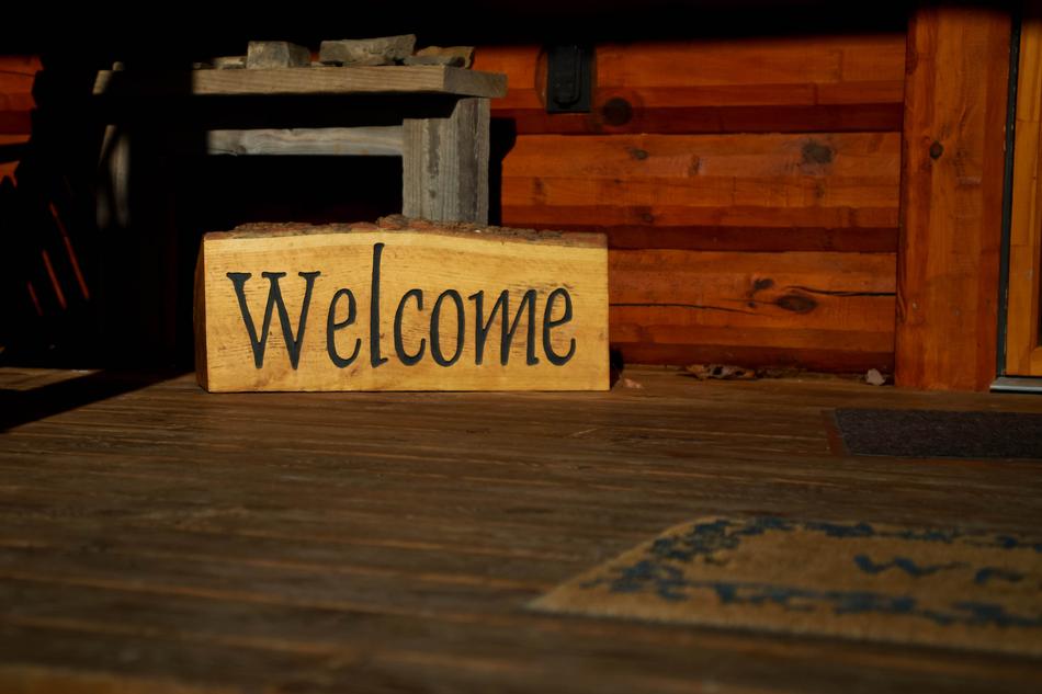 welcome sign near House Interior