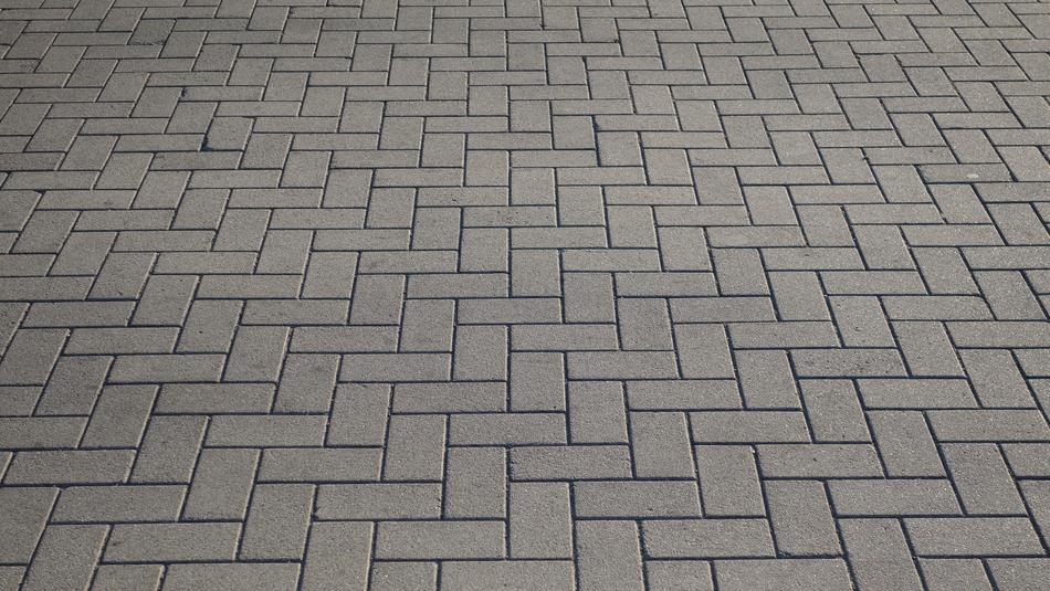 Close-up of the of the beautiful, concrete hatch pattern on the pavement