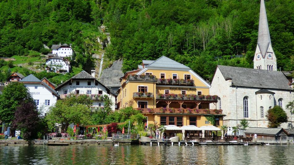 building by the river in a village in Austria