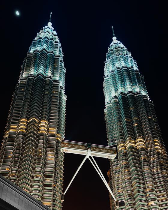 Twin buildings, with the bride, and colorful lights, at the night