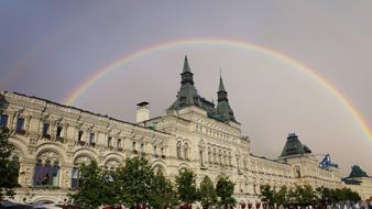 rainbow in the sky over a historic building