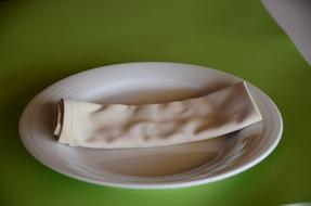 cloth napkin on a plate