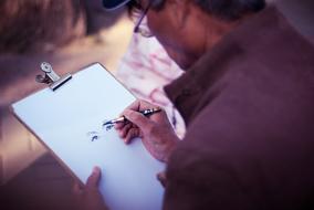 artist paints a portrait