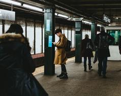 People on platform in railway station