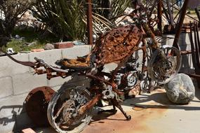 rusty broken motorcycle